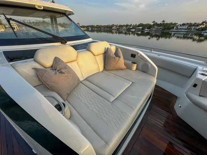 Slide: The Image of Luxurious seating on 2020 Ocean Alexander 45 Divergence Sport yacht, with plush cushions and serene water view. - 35