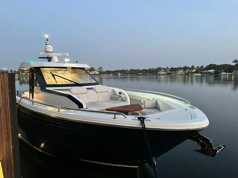 Slide: The Image of 2020 Ocean Alexander 45 Divergence Sport yacht docked on calm water. - 37