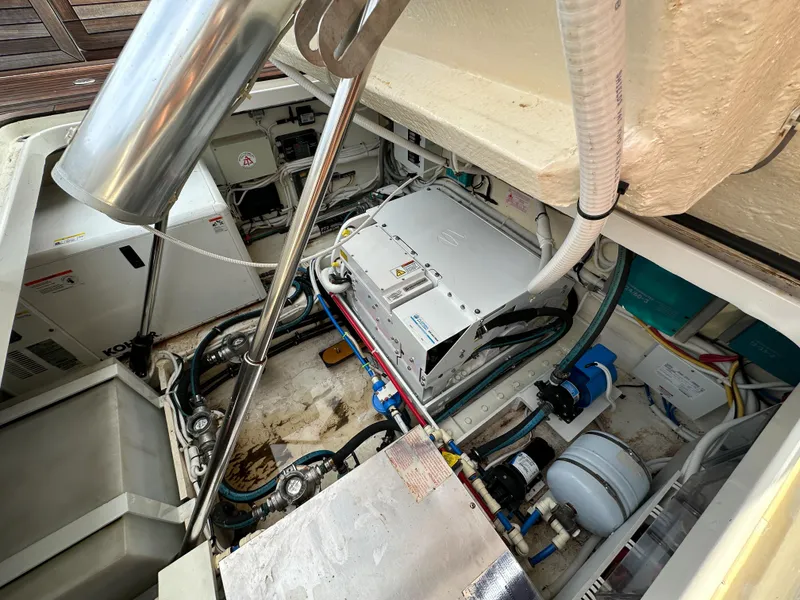 Slide: The Image of Engine compartment of 2020 Ocean Alexander 45 Divergence Sport boat, showcasing mechanical components. - 40
