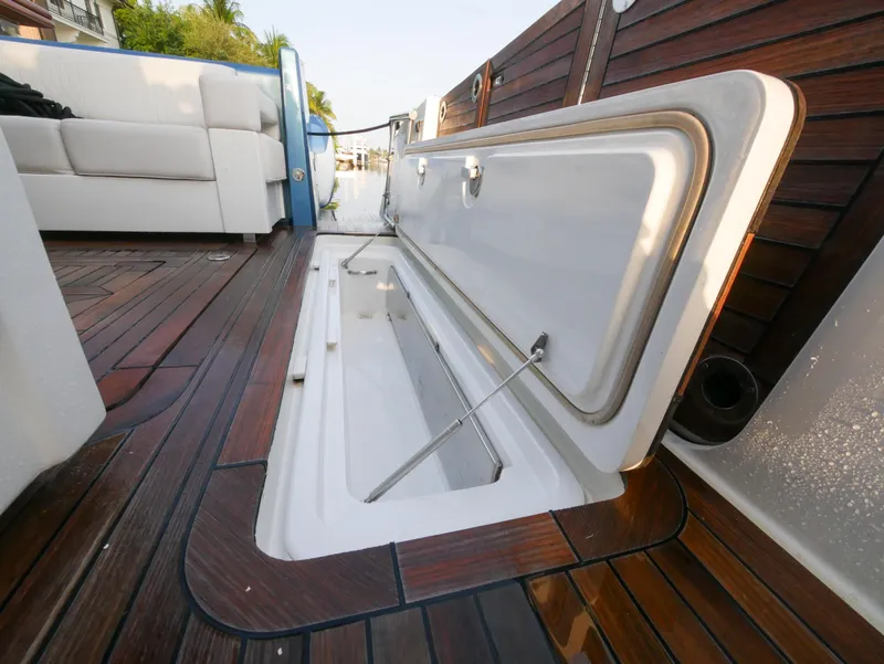 Slide: The Image of 2020 Ocean Alexander 45 Divergence Sport yacht with open deck storage compartment. - 6