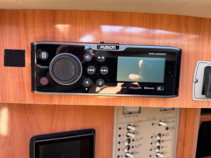 Slide: The Image of Fusion MS-UD650 stereo system on 1999 Regal 322 Commodore boat dashboard. - 46