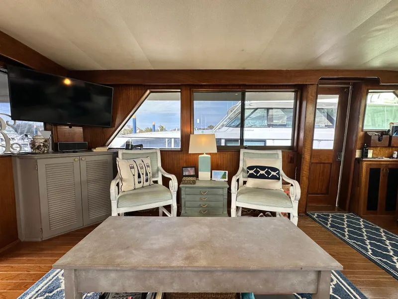 Slide: The Image of Interior of 1978 Hatteras 53 Motor Yacht with elegant seating and decor. - 37