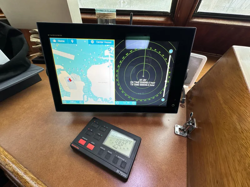 Slide: The Image of Navigation system on 1978 Hatteras 53 Motor Yacht with radar and control panel. - 48