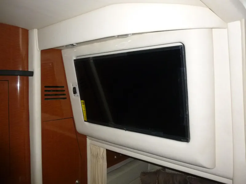Slide: The Image of Flat-screen TV in 2005 Sea Ray 320 Sundancer cabin interior. - 29