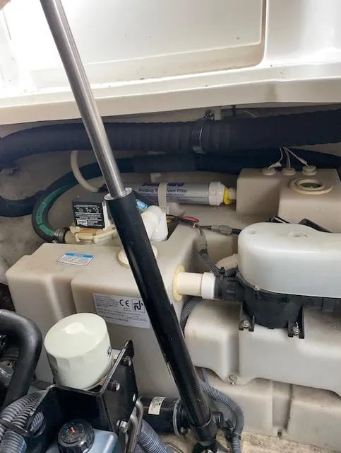 Slide: The Image of Engine compartment of a 2005 Sea Ray 320 Sundancer boat. - 37