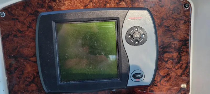 Slide: The Image of Control panel of a 2005 Sea Ray 320 Sundancer boat. - 9