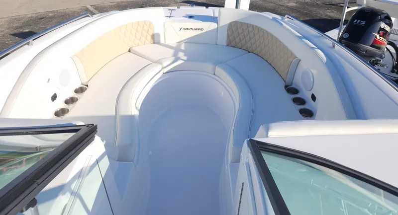 Slide: The Image of 2025 SouthWind 2600 SD boat interior with spacious seating and cup holders. - 14