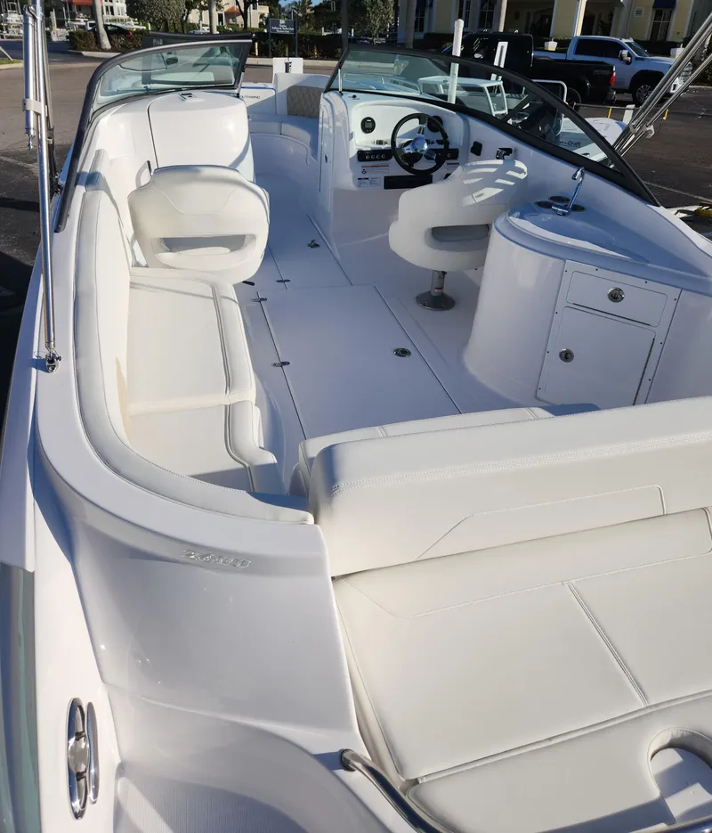 Slide: The Image of 2025 SouthWind 2600 SD boat interior with white seating and modern dashboard. - 7