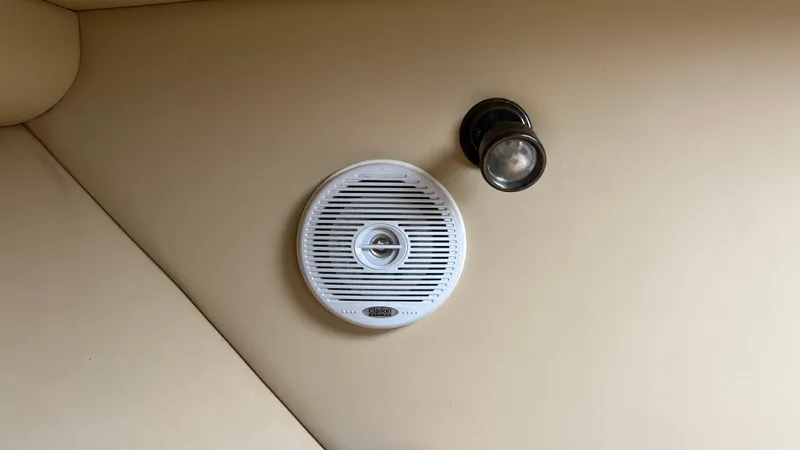 Slide: The Image of Ceiling speaker and light fixture on 2006 Rampage 30 Offshore boat interior. - 30