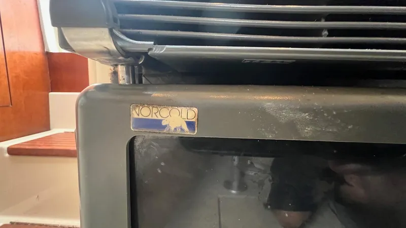 Slide: The Image of Norcold appliance inside a 2006 Rampage 30 Offshore boat. - 39