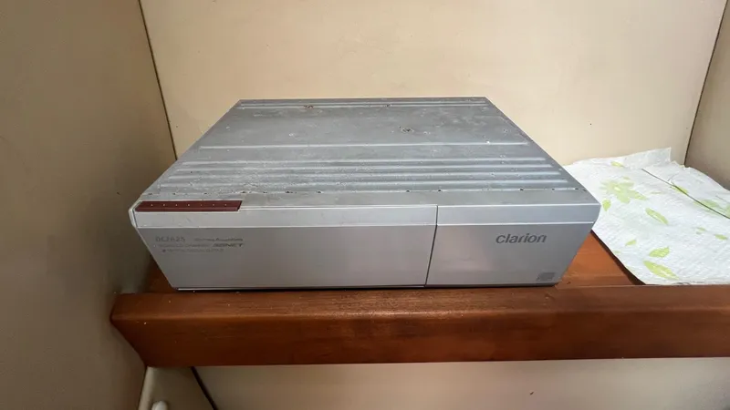 Slide: The Image of Clarion audio equipment on a wooden shelf, Rampage 30 Offshore 2006 model. - 42