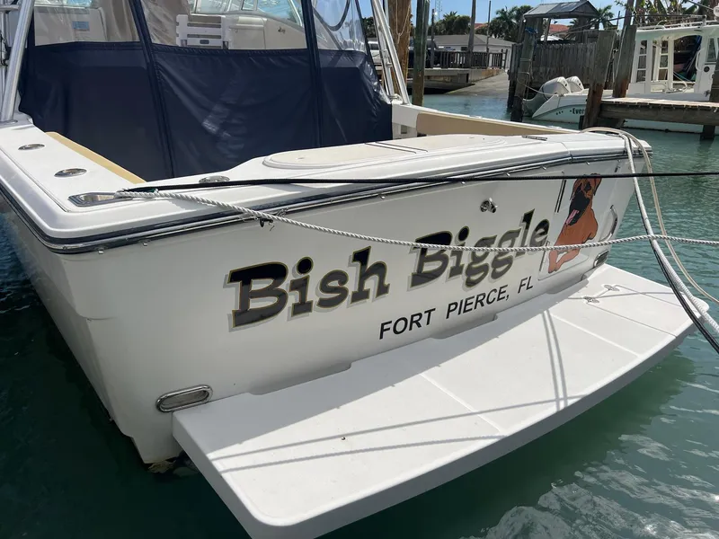 Slide: The Image of 2006 Rampage 30 Offshore boat docked in Fort Pierce, FL. - 7