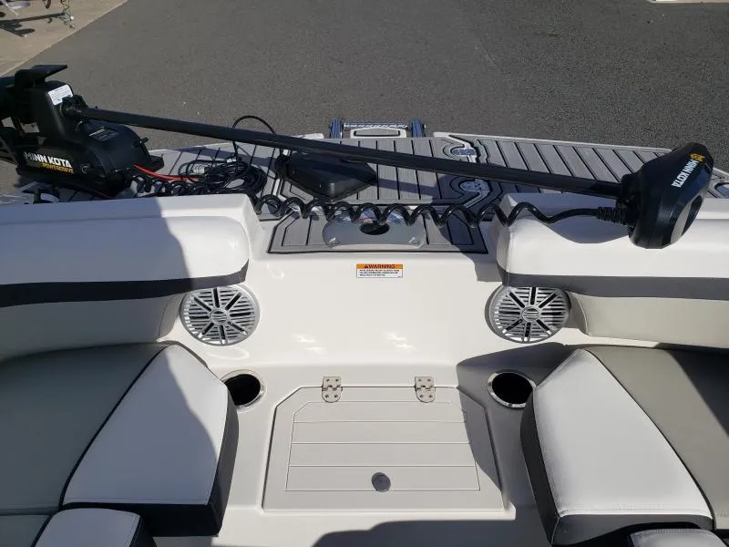 Slide: The Image of 2024 Starcraft SVX 190 OB boat interior with Minn Kota trolling motor and seating area. - 17