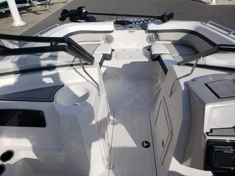 Slide: The Image of 2024 Starcraft SVX 190 OB boat interior with seating and speakers. - 19