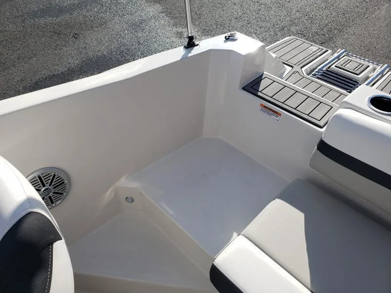 Slide: The Image of 2024 Starcraft SVX 190 OB boat interior, featuring seating and deck details. - 25