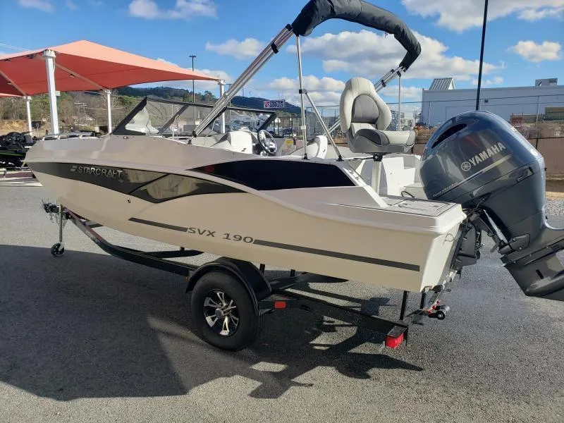 Slide: The Image of 2024 Starcraft SVX 190 OB boat with Yamaha outboard motor on trailer. - 8