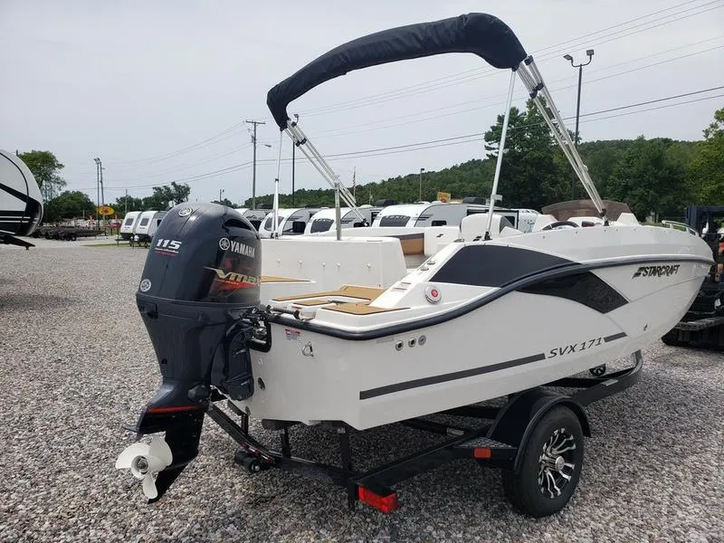 Slide: The Image of 2023 Starcraft SVX 171 OB boat with Yamaha outboard motor on a trailer. - 12