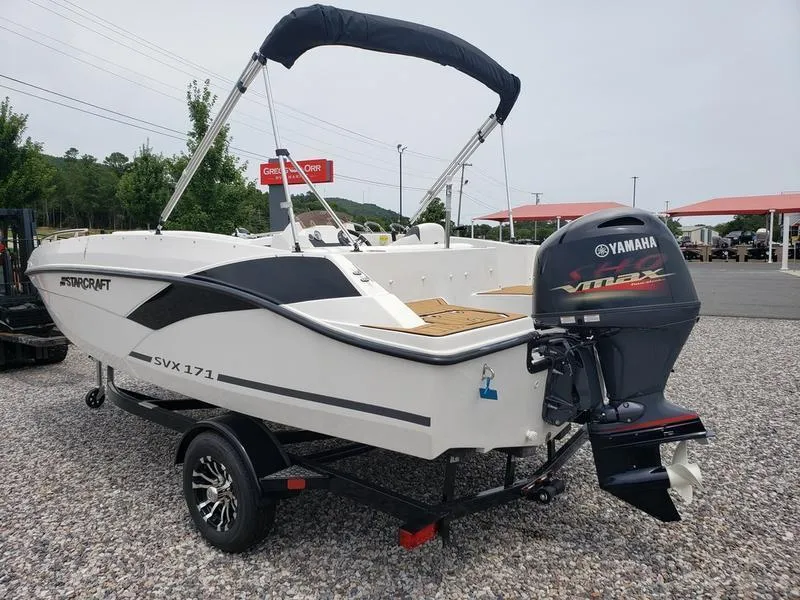 Slide: The Image of 2023 Starcraft SVX 171 OB boat with Yamaha VMAX engine on a trailer. - 14