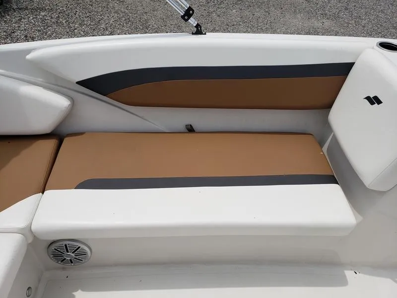 Slide: The Image of 2023 Starcraft SVX 171 OB boat interior with tan and white seating. - 6