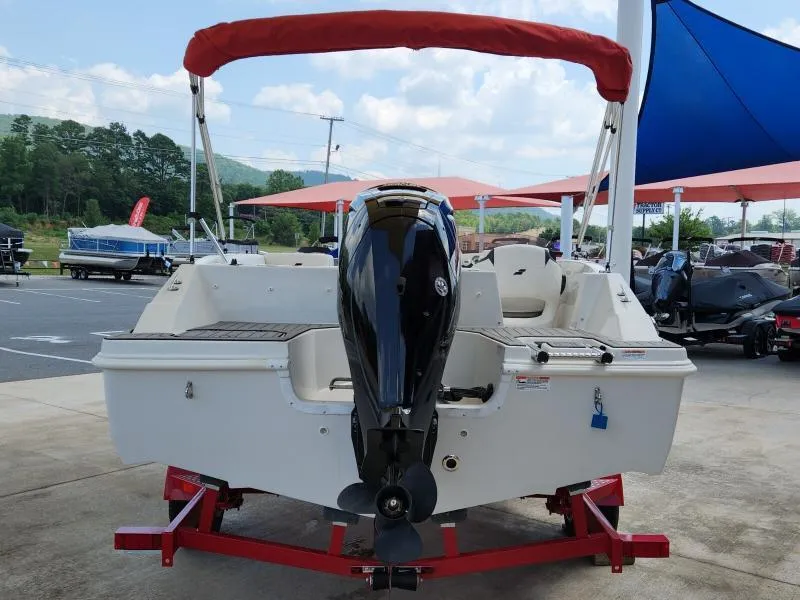 Slide: The Image of 2024 Starcraft SVX 171 OB boat with outboard motor on trailer. - 23