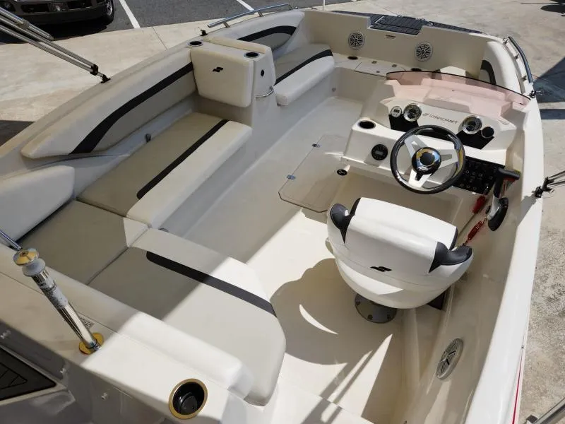 Slide: The Image of 2024 Starcraft SVX 171 OB boat interior with seating and steering console. - 25