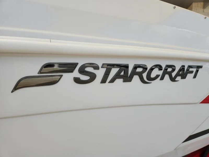 Slide: The Image of 2024 Starcraft SVX 171 OB boat logo on white surface. - 3