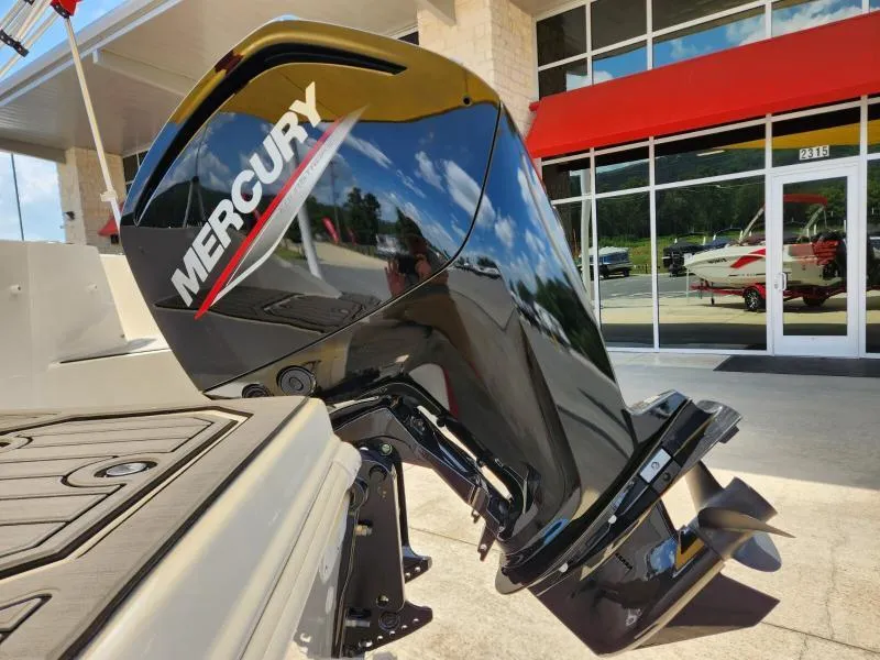 Slide: The Image of 2024 Starcraft SVX 171 OB with Mercury outboard motor, displayed outdoors. - 9