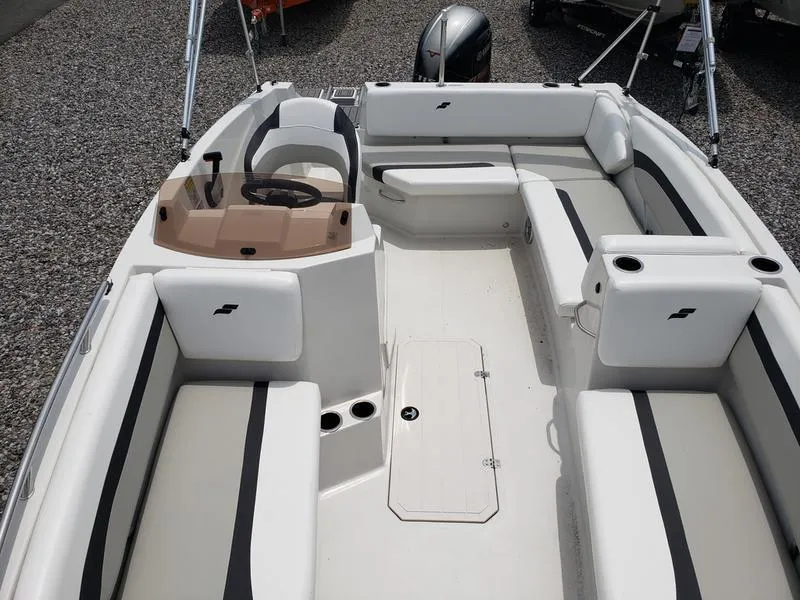 Slide: The Image of 2023 Starcraft SVX 171 OB boat interior with spacious seating and modern design. - 14