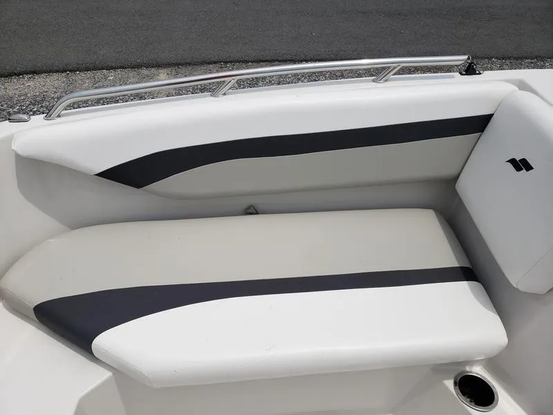 Slide: The Image of 2023 Starcraft SVX 171 OB boat interior seating with sleek design and comfortable cushions. - 15