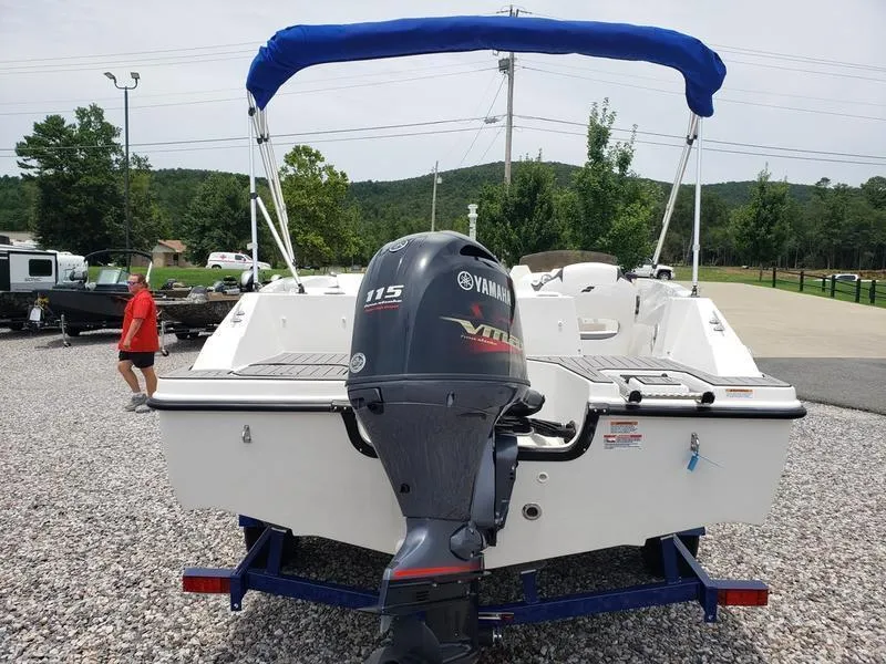 Slide: The Image of 2023 Starcraft SVX 171 OB boat with Yamaha 115 engine, parked on gravel. - 6