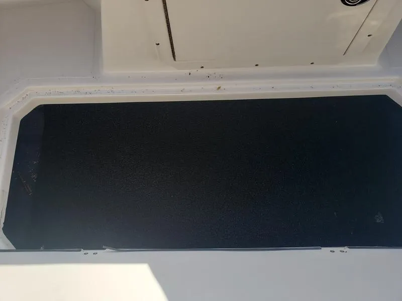 Slide: The Image of 2023 Starcraft SVX191OB boat interior storage compartment. - 17