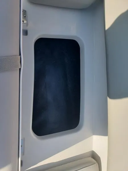 Slide: The Image of 2023 Starcraft SVX191OB boat interior storage compartment. - 25