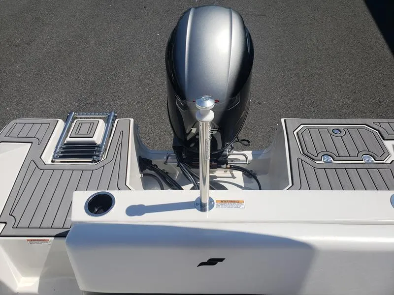 Slide: The Image of 2023 Starcraft SVX 171 OB boat stern with outboard motor and swim platform. - 11