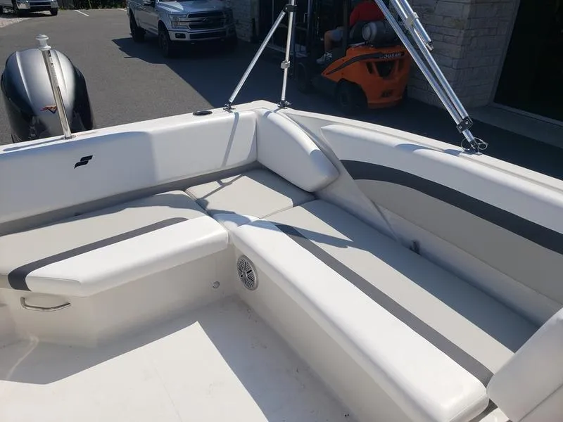 Slide: The Image of 2023 Starcraft SVX 171 OB boat interior with gray seating and modern design. - 14