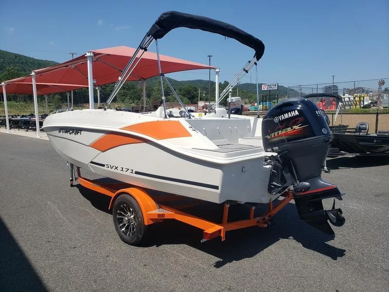 Slide: The Image of 2023 Starcraft SVX 171 OB boat with Yamaha engine on orange trailer. - 5