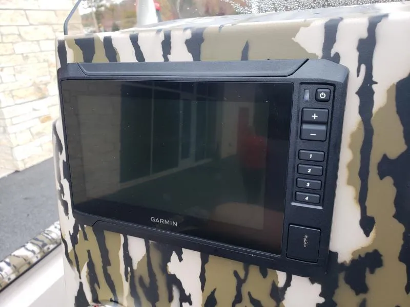 Slide: The Image of Garmin display on 2024 Avid Rogue 20 CC boat with camouflage pattern. - 14