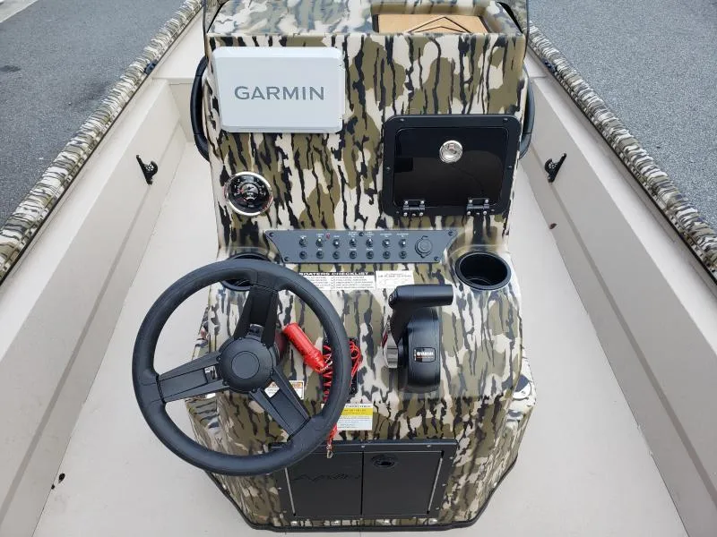 Slide: The Image of 2024 Avid Rogue 20 CC boat console with Garmin system and camouflage design. - 15