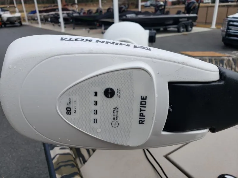 Slide: The Image of Close-up of Minn Kota Riptide motor on 2024 Avid Rogue 20 CC boat. - 21