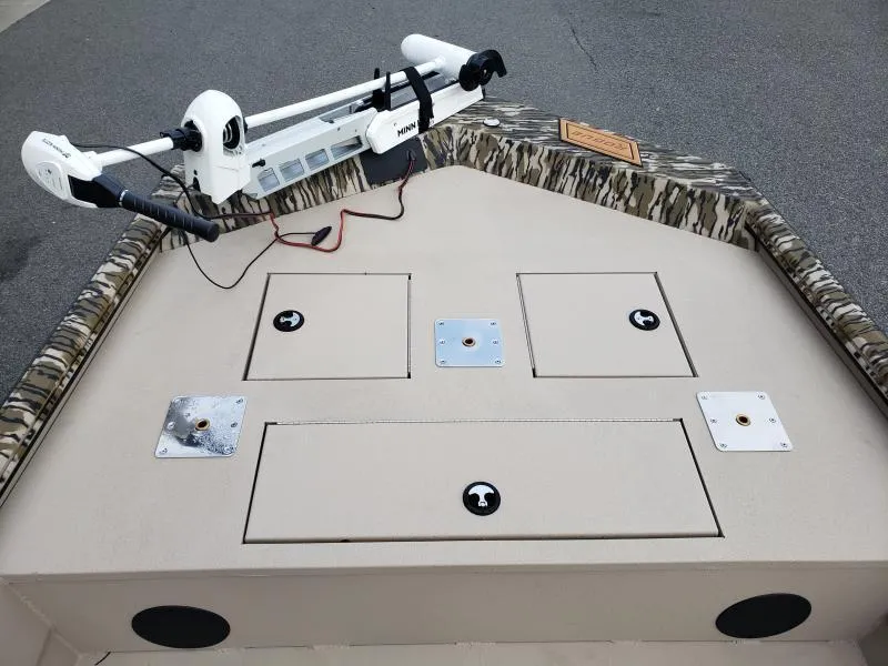 Slide: The Image of 2024 Avid Rogue 20 CC boat deck with mounted trolling motor. - 22