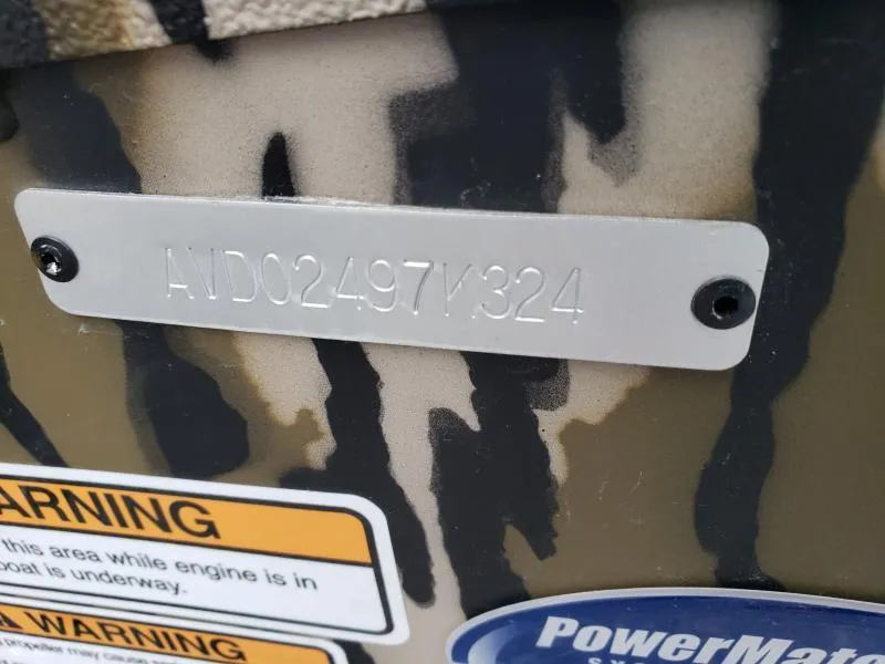 Slide: The Image of 2024 Avid Rogue 20 CC boat identification plate with warning labels. - 24