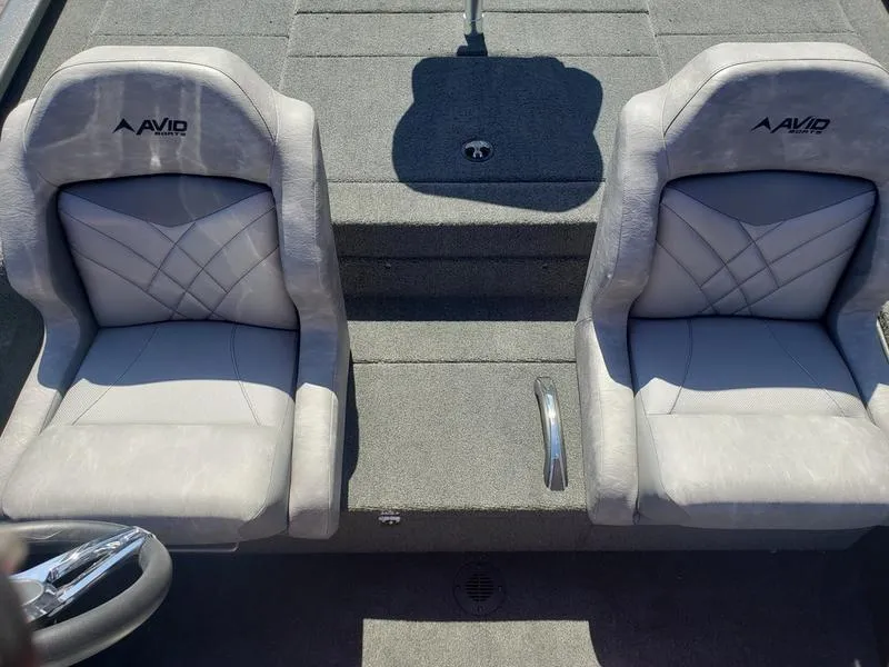 Slide: The Image of 2023 Avid 18XC boat interior with two gray cushioned seats. - 13