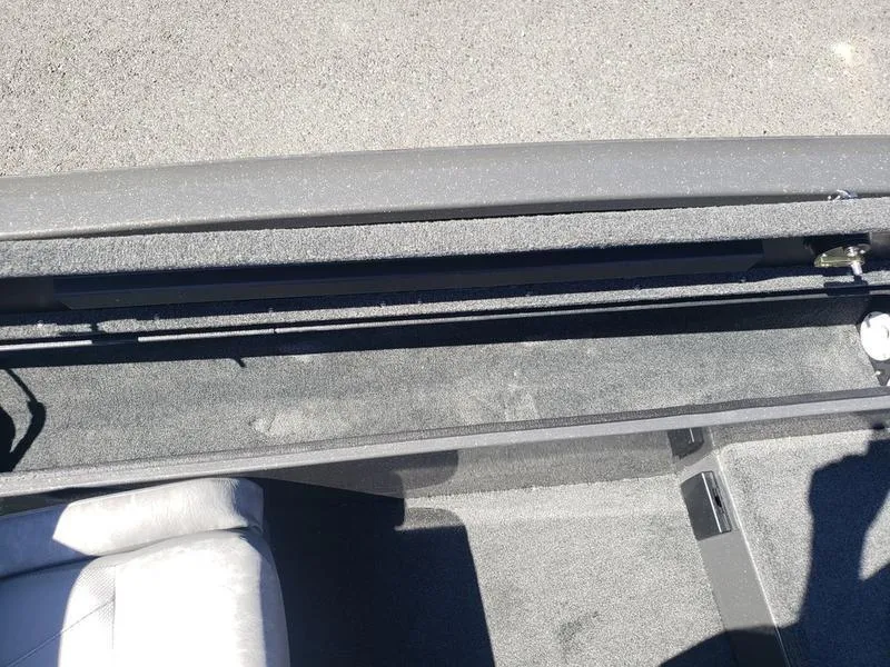 Slide: The Image of Interior view of 2023 Avid 18XC boat storage compartment. - 14