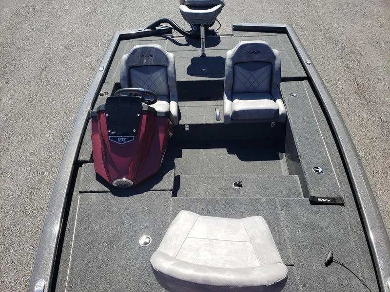 Slide: The Image of 2023 Avid 18XC boat interior with dual seats and steering console. - 20