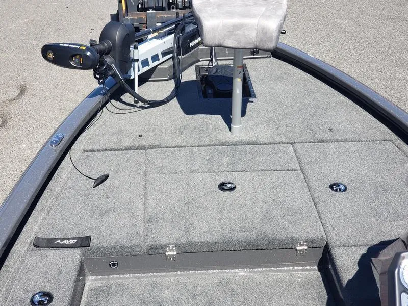 Slide: The Image of 2023 Avid 18XC boat deck with seating and trolling motor. - 22