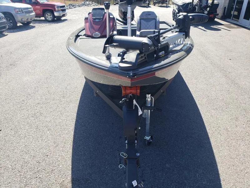 Slide: The Image of 2023 Avid 18XC boat on trailer, parked outdoors in a lot. - 4