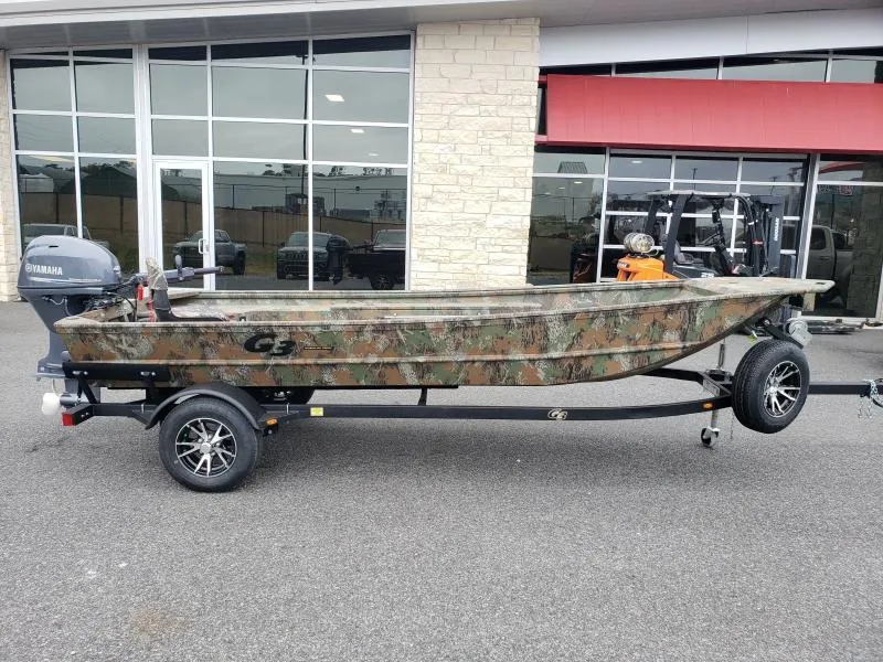 Slide: The Image of 2024 G3 Sportsman 1610 boat with camouflage design on a trailer. - 1