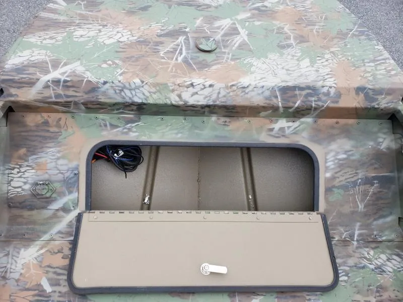 Slide: The Image of 2024 G3 Sportsman 1610 boat with open storage compartment, camo design. - 11