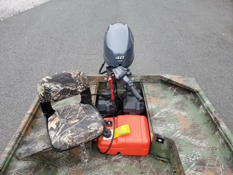 Slide: The Image of 2024 G3 Sportsman 1610 boat with camo seat and Yamaha 40 outboard motor. - 15