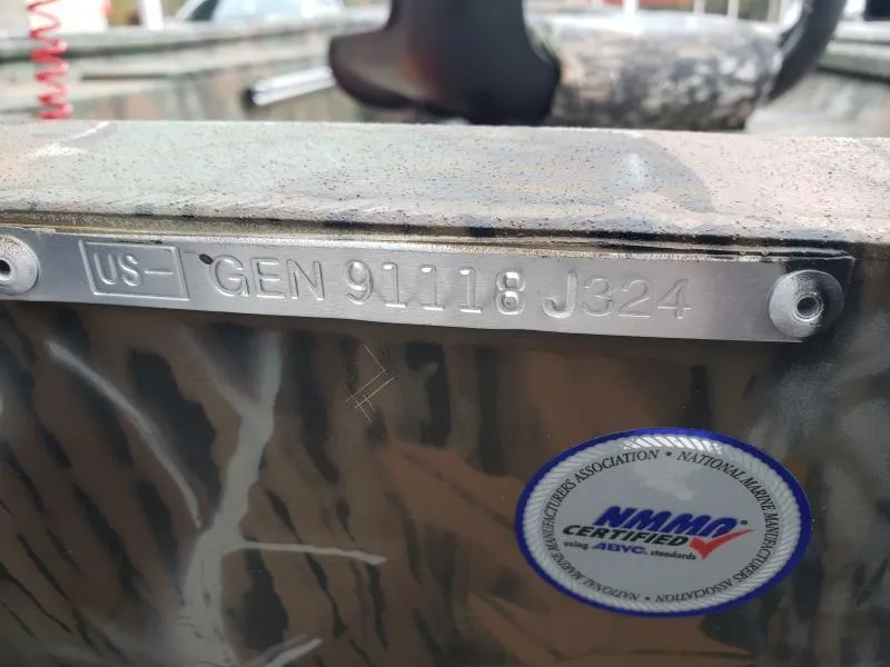 Slide: The Image of 2024 G3 Sportsman 1610 boat with serial number and NMMA certification label. - 16