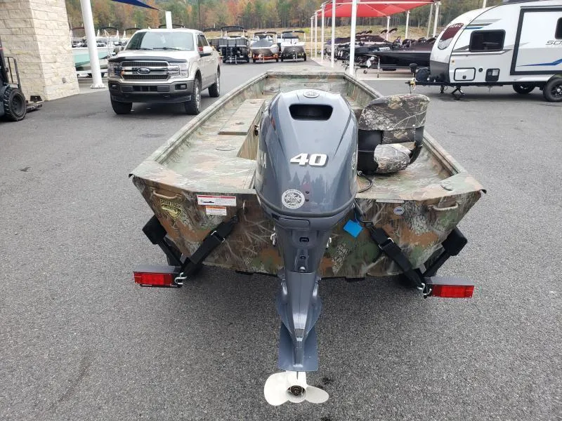 Slide: The Image of 2024 G3 Sportsman 1610 boat with camouflage design and 40 HP outboard motor. - 7